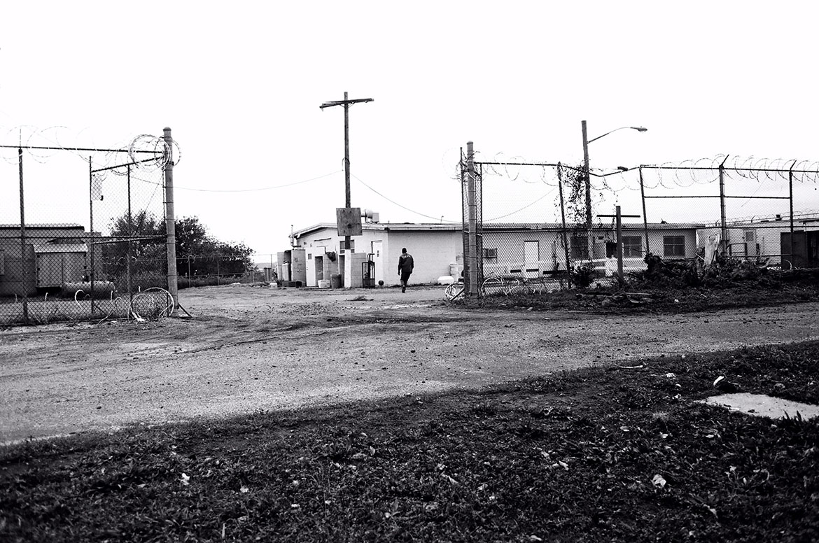 Prisoner shooting hoops alone